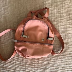 city adventurer backpack micro in pink pastel